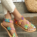 Kuschelige Sandalen mit bunten Schmetterlingen für dich