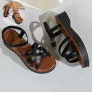 Schicke und bequeme schwarze Sandalen mit Kreuzriemen