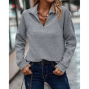 Lena - Graues langärmeliges monochromes Oberteil